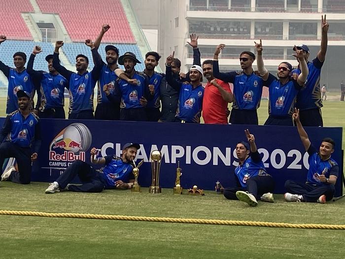 Team celebrating behind the Red Bull Campus Cricket India Champions 2020 banner