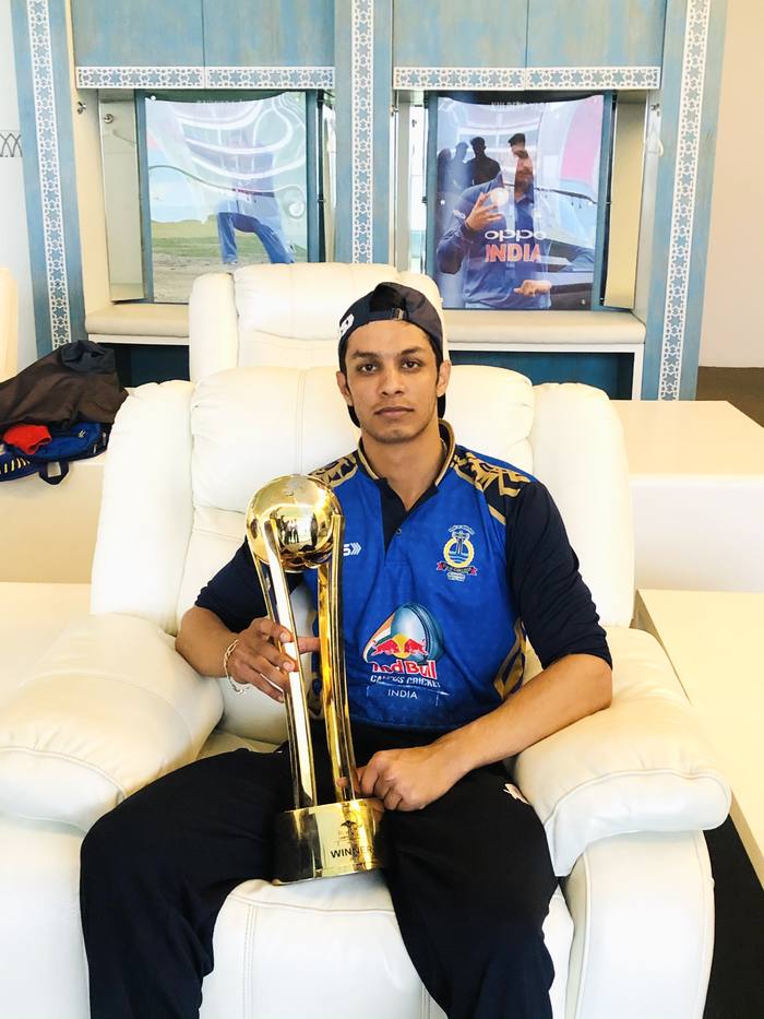 Rishab Saini with the Red Bull Campus Cricket India winner’s trophy